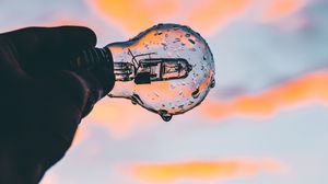 Preview wallpaper lamp, hand, drops, sky