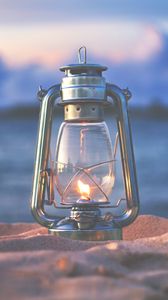 Preview wallpaper lamp, lantern, fire, sand, beach