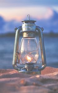 Preview wallpaper lamp, lantern, fire, sand, beach