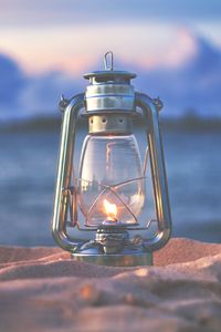 Preview wallpaper lamp, lantern, fire, sand, beach