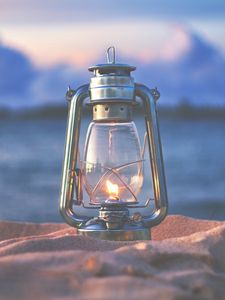 Preview wallpaper lamp, lantern, fire, sand, beach