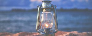 Preview wallpaper lamp, lantern, fire, sand, beach