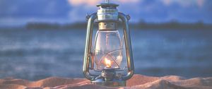 Preview wallpaper lamp, lantern, fire, sand, beach