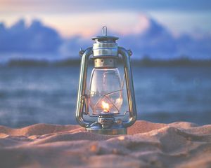 Preview wallpaper lamp, lantern, fire, sand, beach