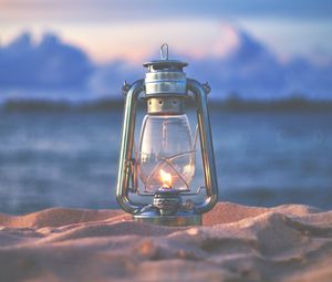 Preview wallpaper lamp, lantern, fire, sand, beach