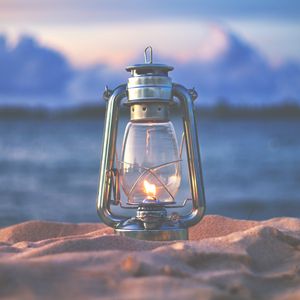 Preview wallpaper lamp, lantern, fire, sand, beach