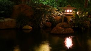 Preview wallpaper lamp, pond, light, china, stones, reflection, night, vegetation