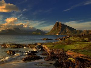 Preview wallpaper land, coast, sea, mountain, slopes, wave, sky, clouds, earth