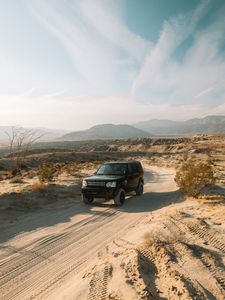 Preview wallpaper land rover, car, suv, black, sand