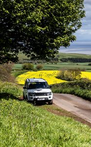 Preview wallpaper land rover, car, suv, white, road, nature