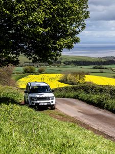 Preview wallpaper land rover, car, suv, white, road, nature