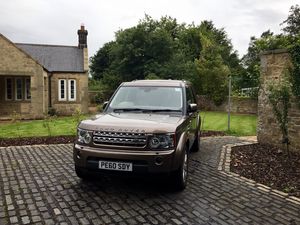 Preview wallpaper land rover, car, suv, brown, parking