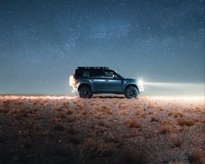 Preview wallpaper land rover defender, land rover, car, suv, gray, night