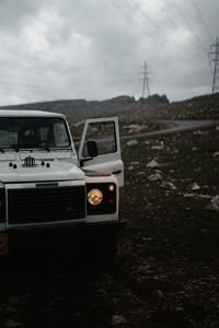 Preview wallpaper land rover defender, land rover, car, white, suv, road