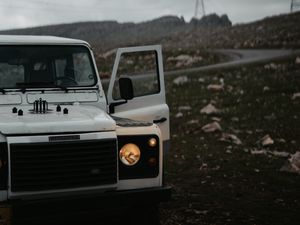 Preview wallpaper land rover defender, land rover, car, white, suv, road