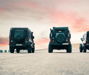 Preview wallpaper land rover defender, land rover, car, suv, black, road