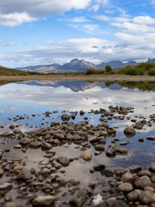 Preview wallpaper landscape, lake, stones, mountains, reflection