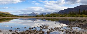 Preview wallpaper landscape, lake, stones, mountains, reflection