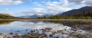 Preview wallpaper landscape, lake, stones, mountains, reflection