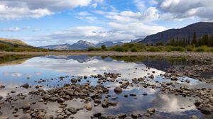 Preview wallpaper landscape, lake, stones, mountains, reflection