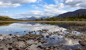 Preview wallpaper landscape, lake, stones, mountains, reflection