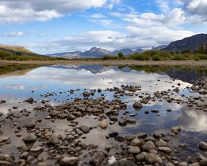 Preview wallpaper landscape, lake, stones, mountains, reflection