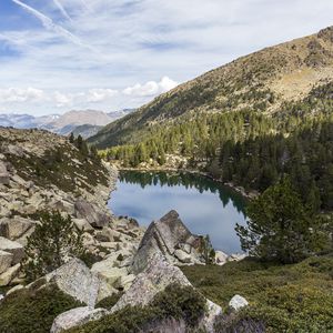 Preview wallpaper landscape, lake, stones, trees, forest, mountains, clouds