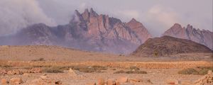 Preview wallpaper landscape, mountains, desert, rocks, fog, stones, nature