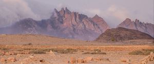 Preview wallpaper landscape, mountains, desert, rocks, fog, stones, nature