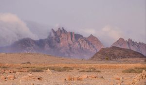 Preview wallpaper landscape, mountains, desert, rocks, fog, stones, nature