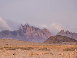 Preview wallpaper landscape, mountains, desert, rocks, fog, stones, nature