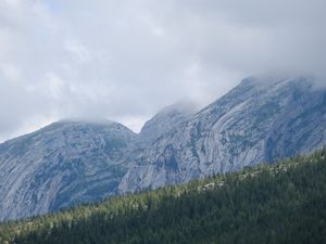 Preview wallpaper landscape, mountains, fog, clouds, trees, slope