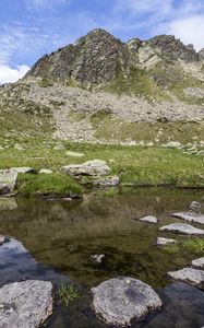 Preview wallpaper landscape, mountains, relief, lake, water, stones