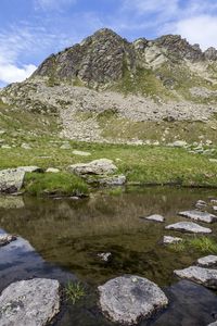 Preview wallpaper landscape, mountains, relief, lake, water, stones