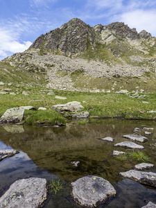 Preview wallpaper landscape, mountains, relief, lake, water, stones