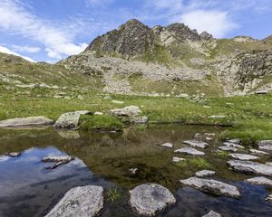 Preview wallpaper landscape, mountains, relief, lake, water, stones