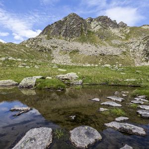 Preview wallpaper landscape, mountains, relief, lake, water, stones