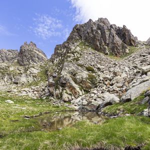 Preview wallpaper landscape, rock, relief, water, grass, nature