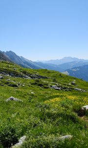 Preview wallpaper landscape, slope, grass, stones, mountains, sky