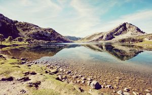 Preview wallpaper landscape, stones, coast, lake, mountains, colors, faded, inscription