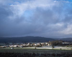 Preview wallpaper landscape, village, field, sky, clouds, nature