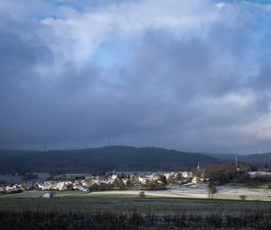 Preview wallpaper landscape, village, field, sky, clouds, nature