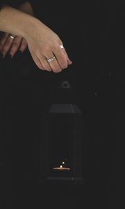 Preview wallpaper lantern, candle, fire, hand, black