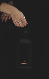 Preview wallpaper lantern, candle, fire, hand, black