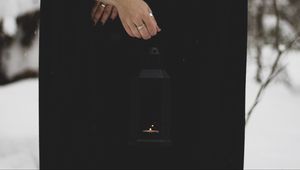 Preview wallpaper lantern, candle, fire, hand, black