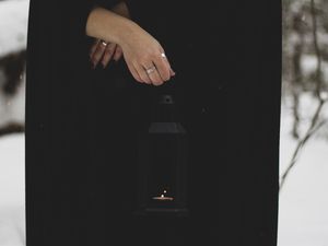 Preview wallpaper lantern, candle, fire, hand, black