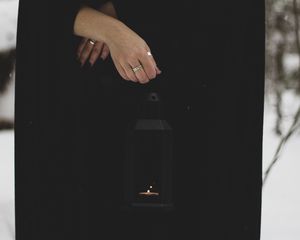 Preview wallpaper lantern, candle, fire, hand, black