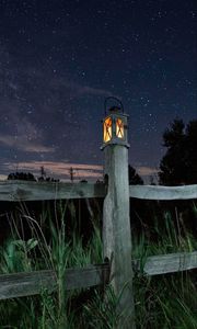 Preview wallpaper lantern, fence, starry sky, sky, night, grass