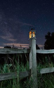 Preview wallpaper lantern, fence, starry sky, sky, night, grass
