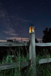 Preview wallpaper lantern, fence, starry sky, sky, night, grass
